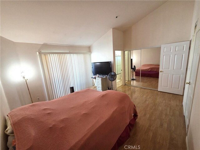9146 Tobias Ave Unit 3, Panorama City, CA 91402 - bedroom featuring wood finished floors and high vaulted ceiling