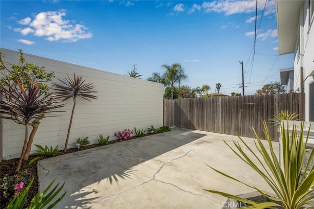 view of patio with fence