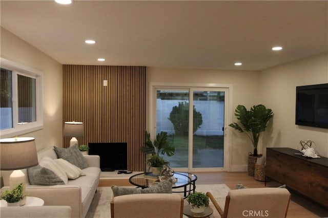 living room featuring recessed lighting and wood finished floors