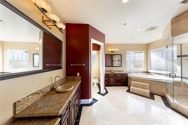 bathroom featuring two vanities, visible vents, a stall shower, a sink, and a bath