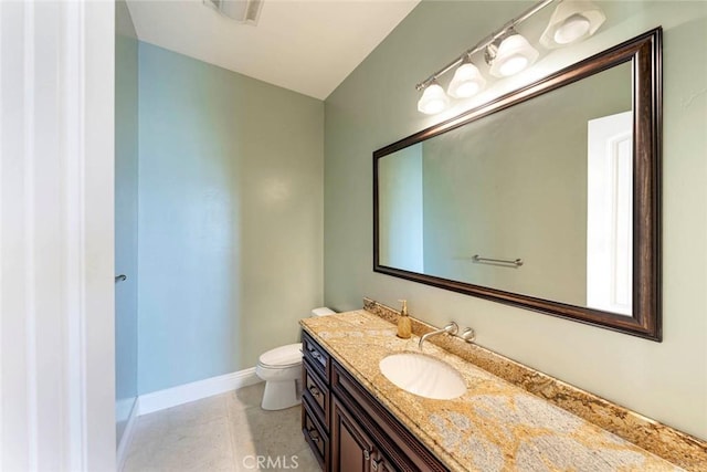 bathroom with visible vents, baseboards, toilet, tile patterned flooring, and vanity