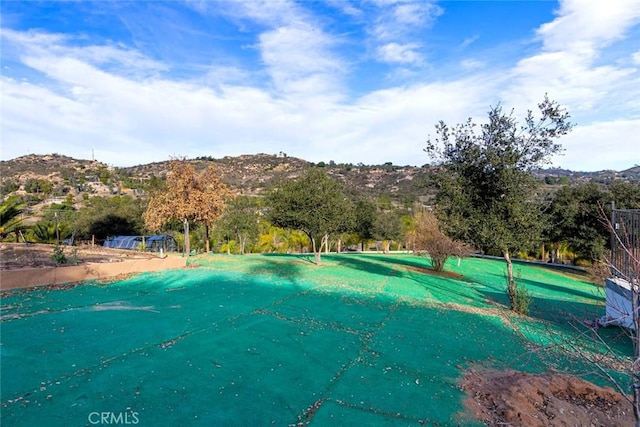 view of pool with a mountain view