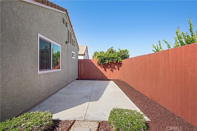 view of patio with a fenced backyard