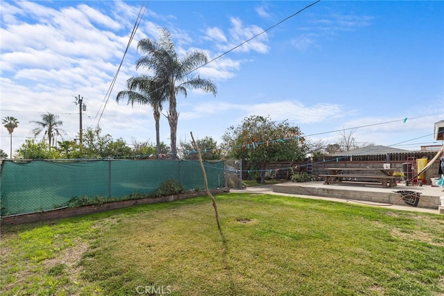 view of yard with a fenced backyard