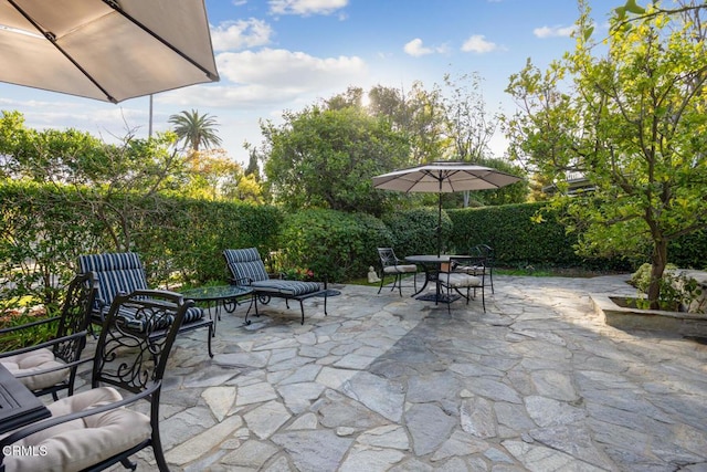 view of patio featuring outdoor dining space