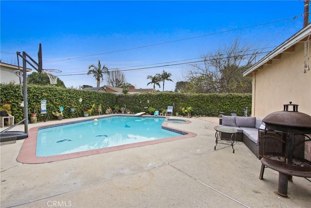 view of pool with a fenced in pool, fence private yard, a patio, and an in ground hot tub