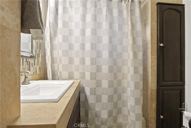 bathroom with vanity and a shower with curtain