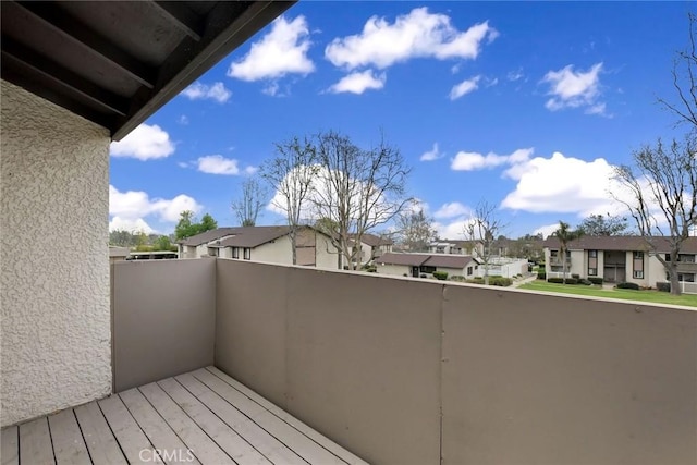 balcony featuring a residential view