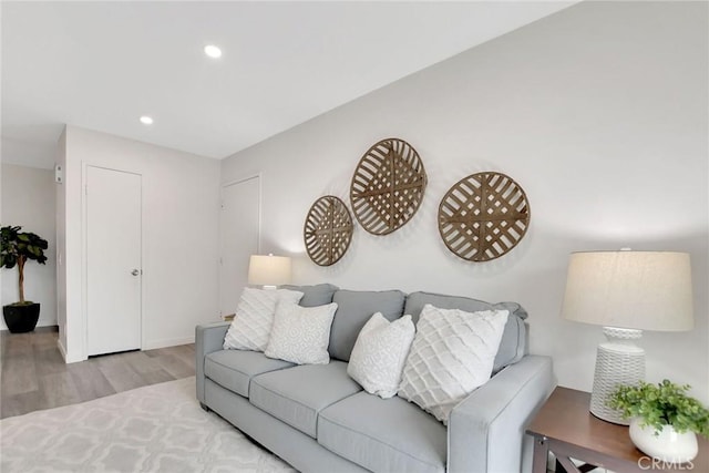 living area featuring recessed lighting and wood finished floors