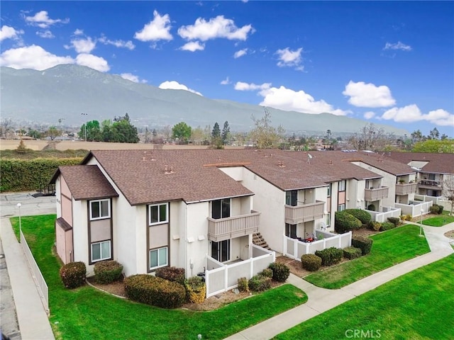 exterior space featuring a residential view and a mountain view