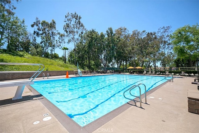 pool with a patio area