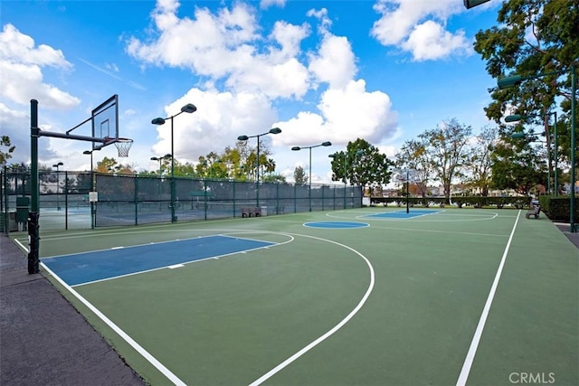 view of sport court with community basketball court and fence