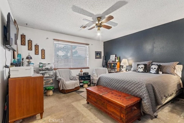 bedroom featuring visible vents, a ceiling fan, light colored carpet, a textured wall, and a textured ceiling