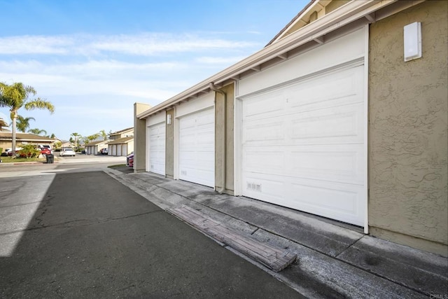 garage featuring a residential view