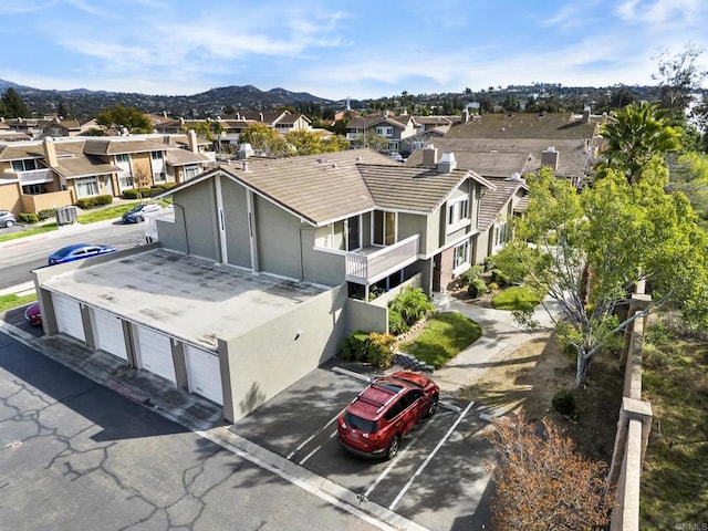 aerial view with a mountain view and a residential view