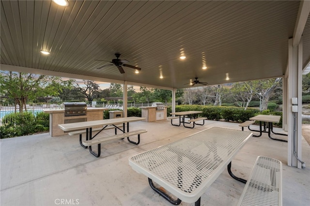 view of patio / terrace featuring outdoor dining space, ceiling fan, area for grilling, and fence