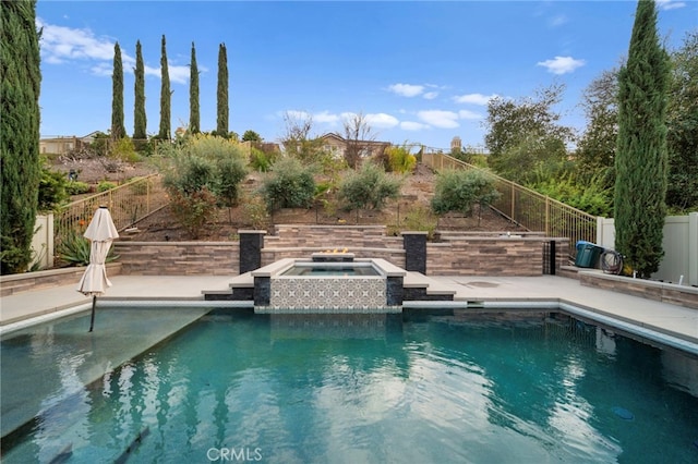 view of swimming pool with a patio area, a fenced backyard, and a fenced in pool