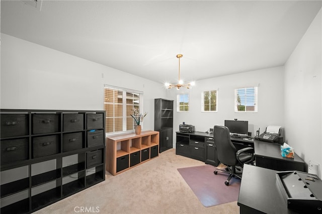 office space featuring a notable chandelier and light colored carpet