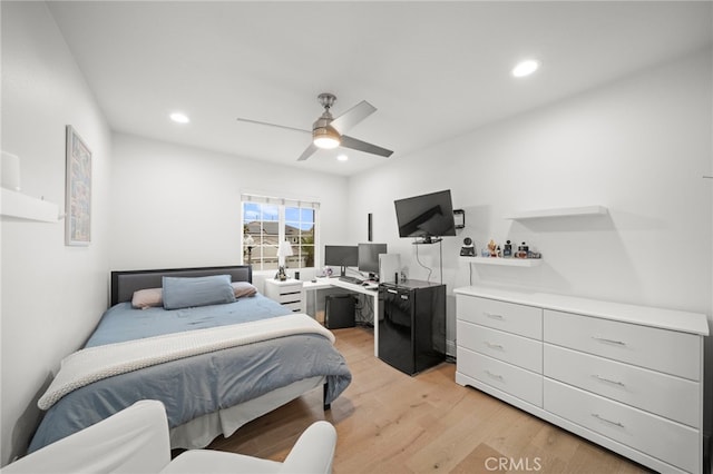 bedroom with light wood-type flooring, ceiling fan, and recessed lighting