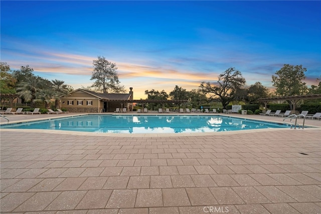 pool with a patio area