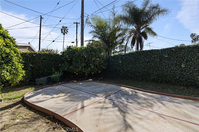 exterior space with a fenced backyard