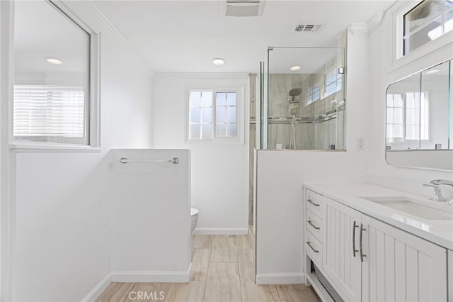 bathroom featuring a healthy amount of sunlight and visible vents