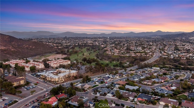 aerial view at dusk with a mountain view