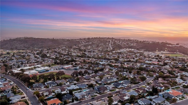 aerial view at dusk with a residential view