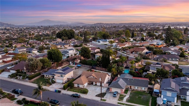 bird's eye view featuring a mountain view and a residential view