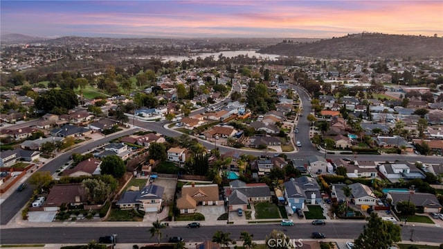 aerial view at dusk with a residential view