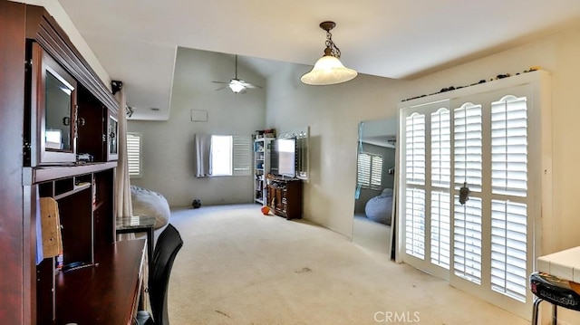 interior space featuring ceiling fan