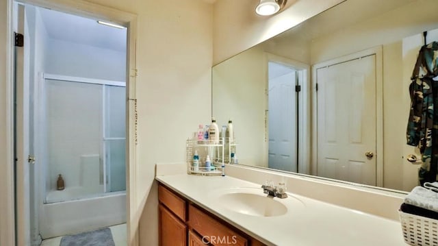 full bathroom featuring washtub / shower combination and vanity