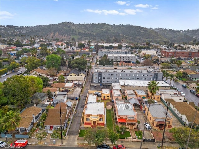 drone / aerial view featuring a mountain view