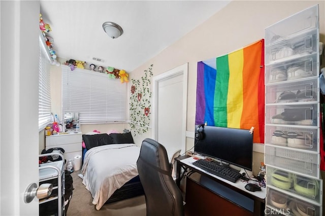 carpeted bedroom with visible vents