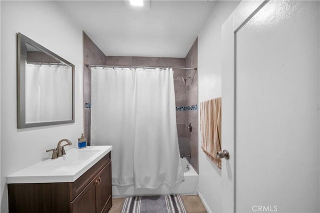 full bathroom featuring shower / bathtub combination with curtain and vanity