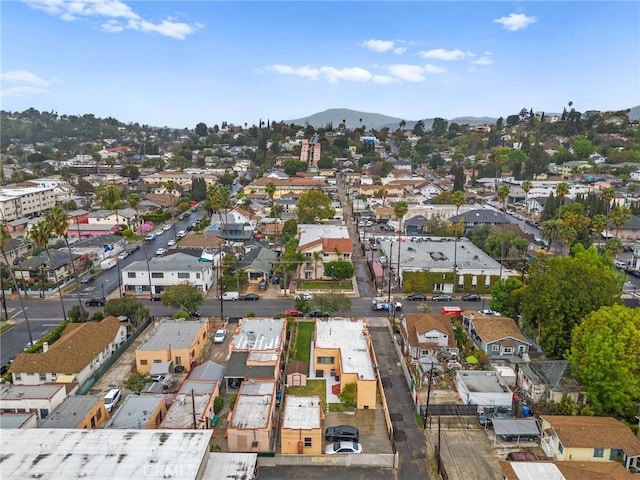 drone / aerial view with a residential view and a mountain view