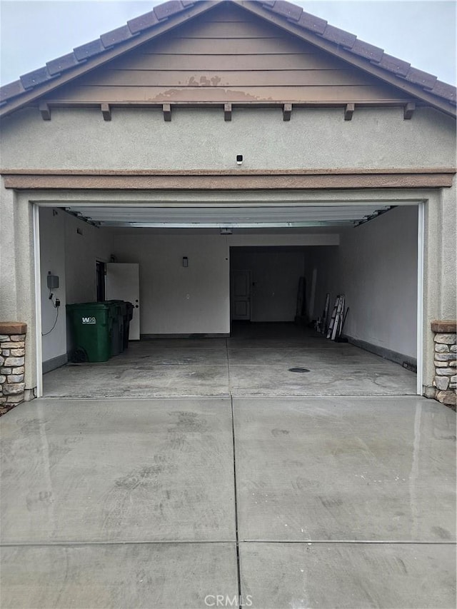 garage featuring driveway