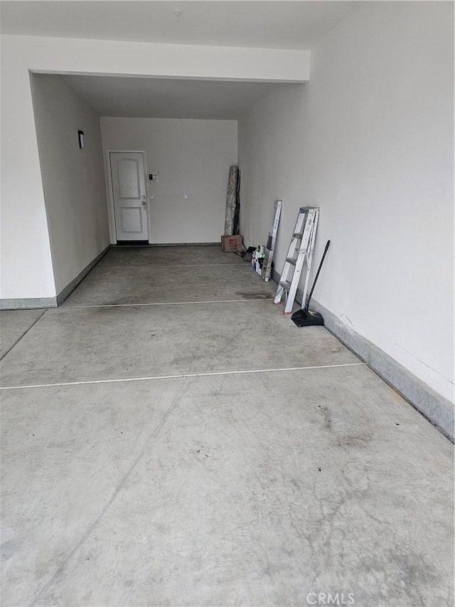 garage with baseboards