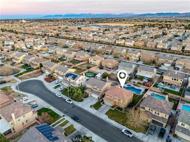 birds eye view of property featuring a residential view and a mountain view