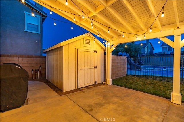 view of shed featuring a fenced backyard