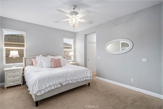 bedroom featuring carpet floors, ceiling fan, and baseboards