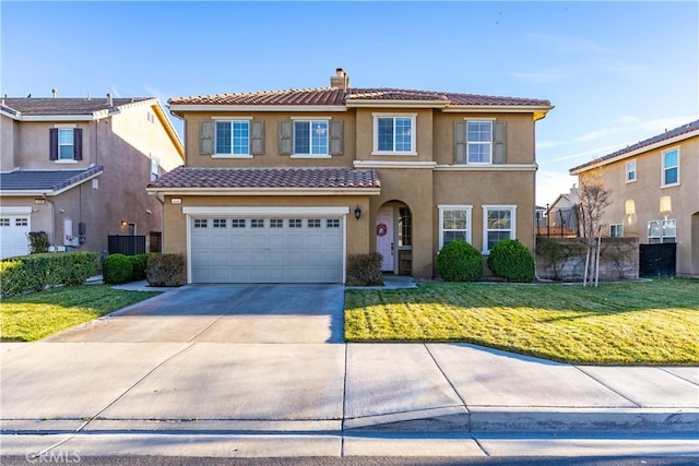 view of front of property with concrete driveway, stucco siding, a tile roof, a chimney, and a front yard