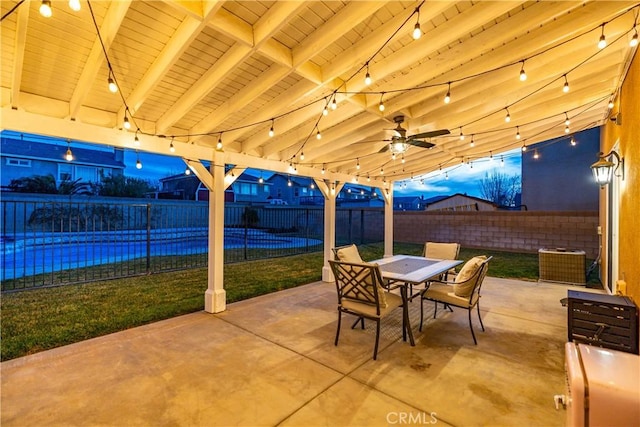 view of patio / terrace featuring a ceiling fan, outdoor dining space, and a fenced backyard