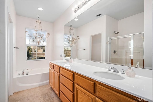 full bathroom with a bath, a stall shower, a sink, and visible vents