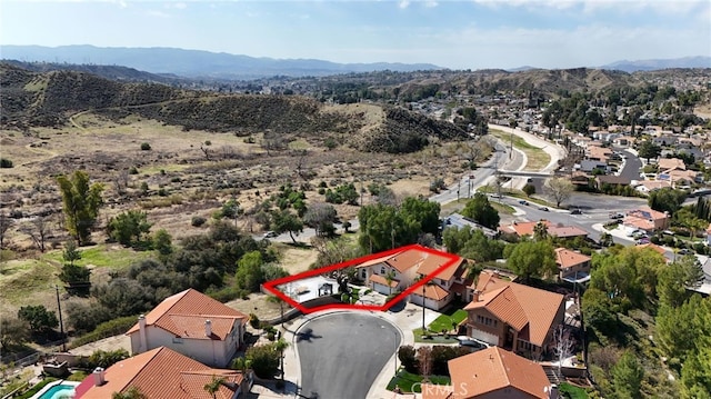 bird's eye view with a residential view and a mountain view