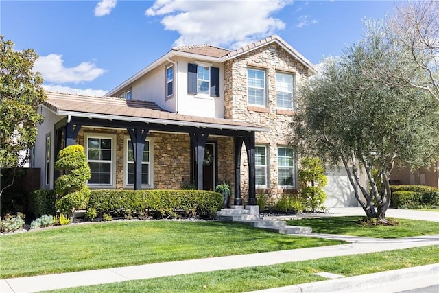 view of front of property featuring a front yard, stucco siding, concrete driveway, stone siding, and a tile roof