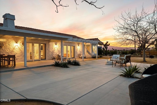 view of patio featuring french doors