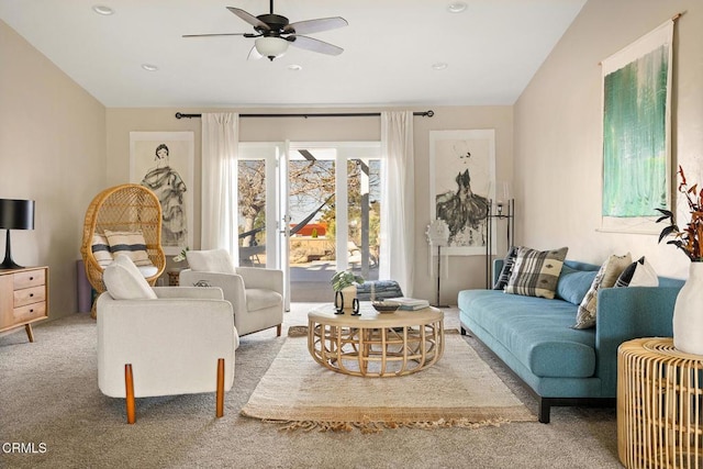 carpeted living area with recessed lighting and a ceiling fan