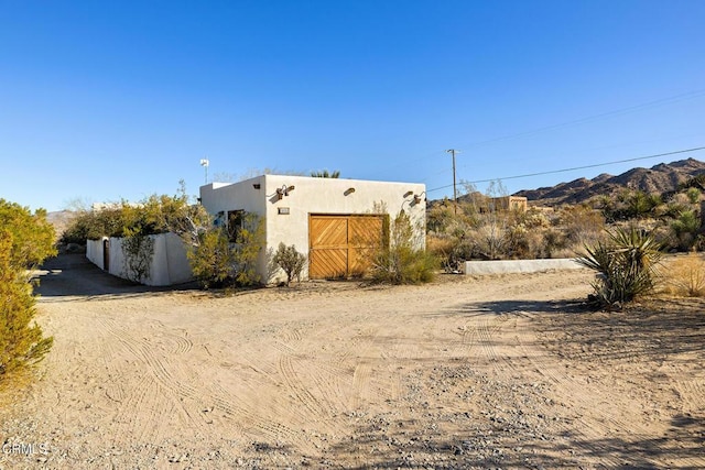 view of home's exterior with stucco siding