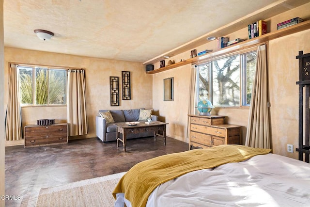 bedroom with concrete floors